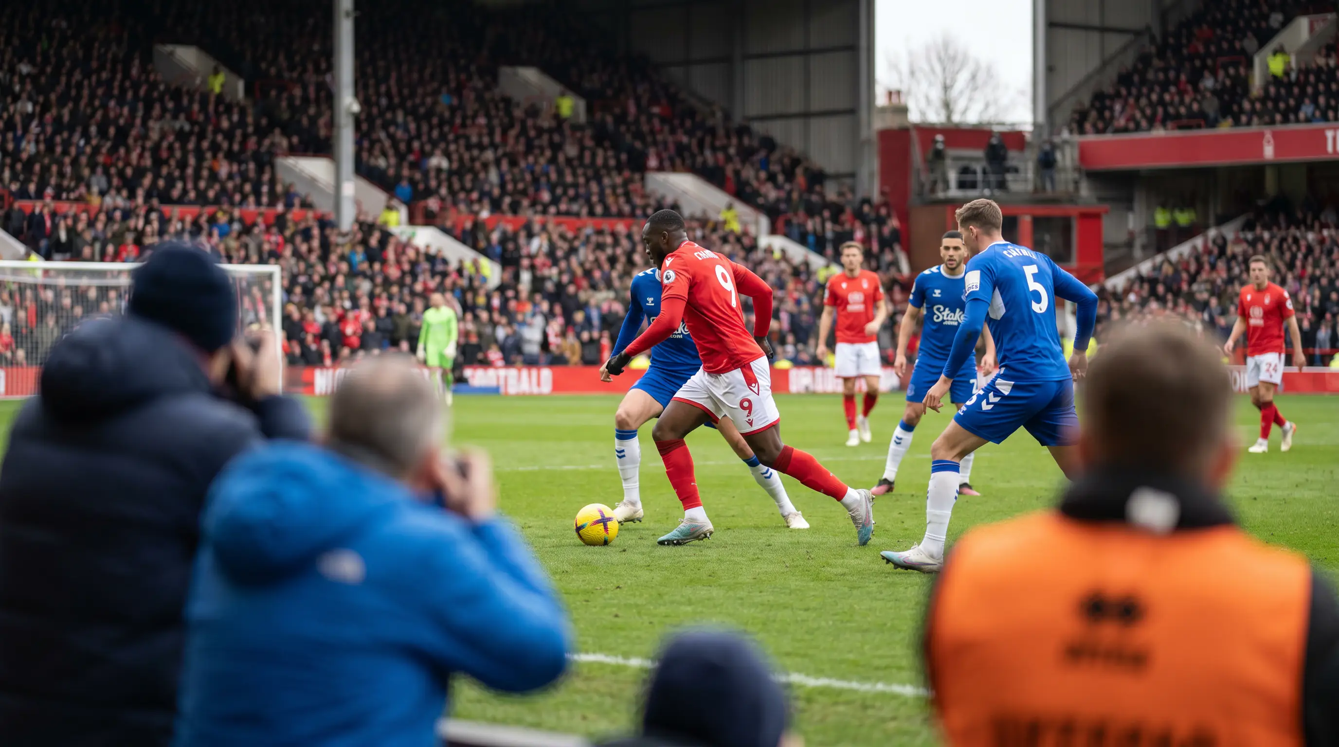 Premier League striker breaking through a stretched defensive line during open play