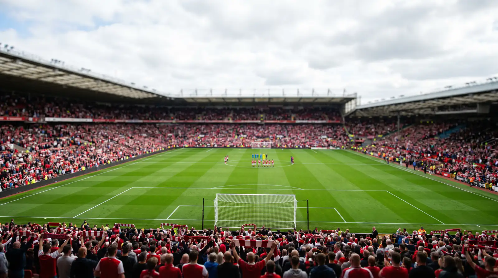 Crowded English football stadium on a Saturday afternoon with home fans in the stands