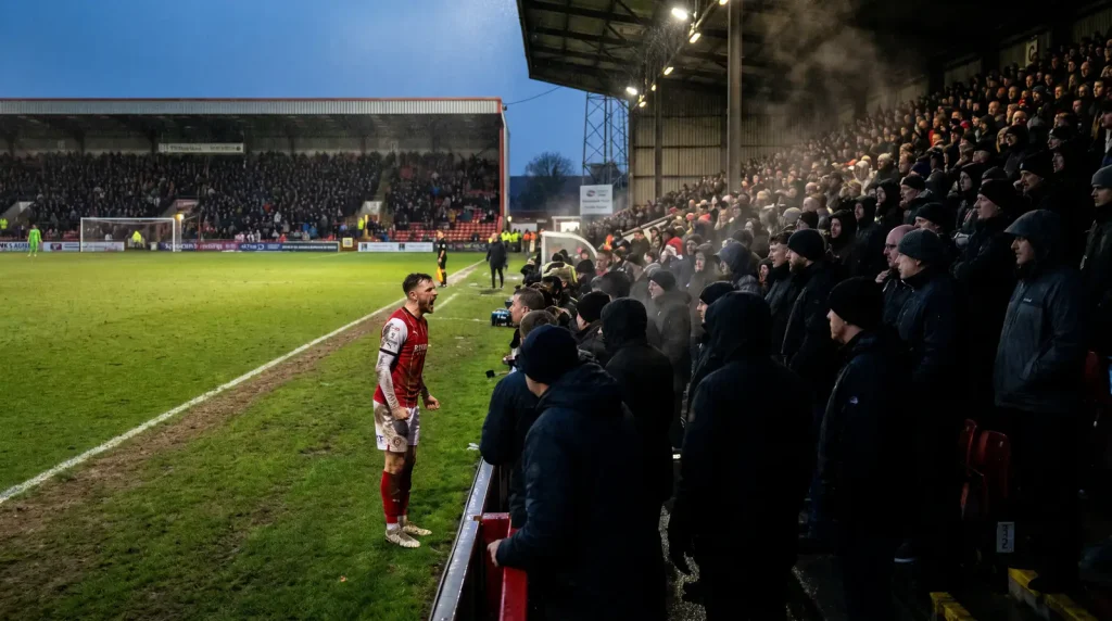 League One match between two English third-tier sides at a packed lower-league stadium