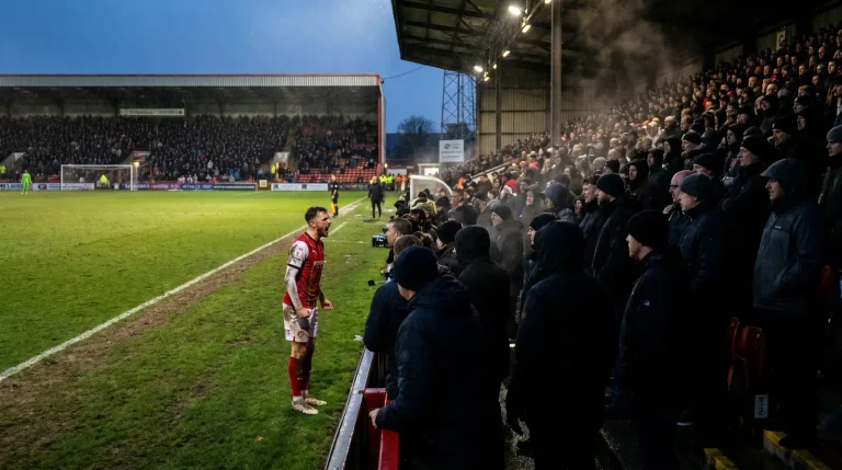 League One match between two English third-tier sides at a packed lower-league stadium