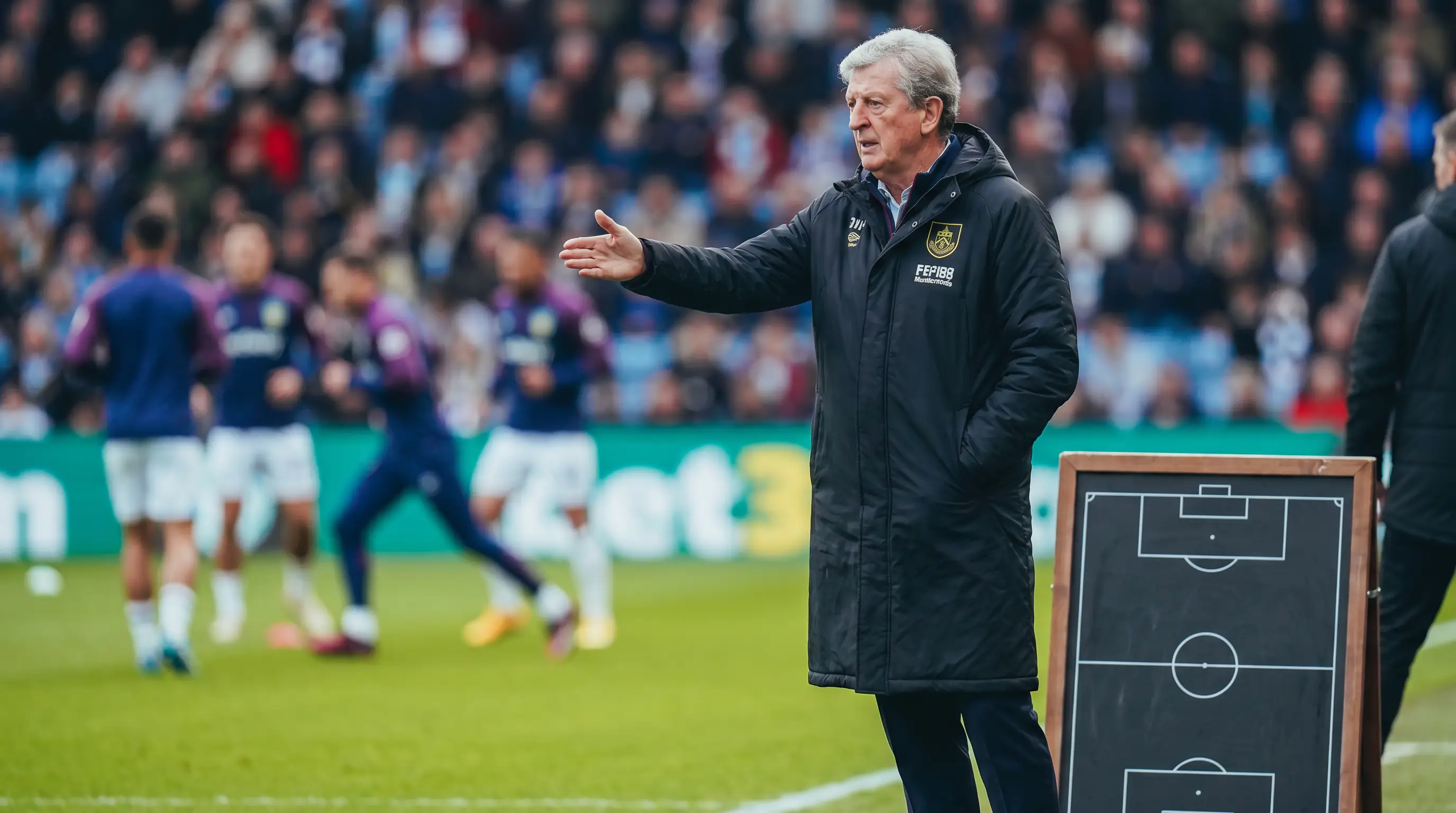 Long-serving Premier League manager directing a familiar tactical system