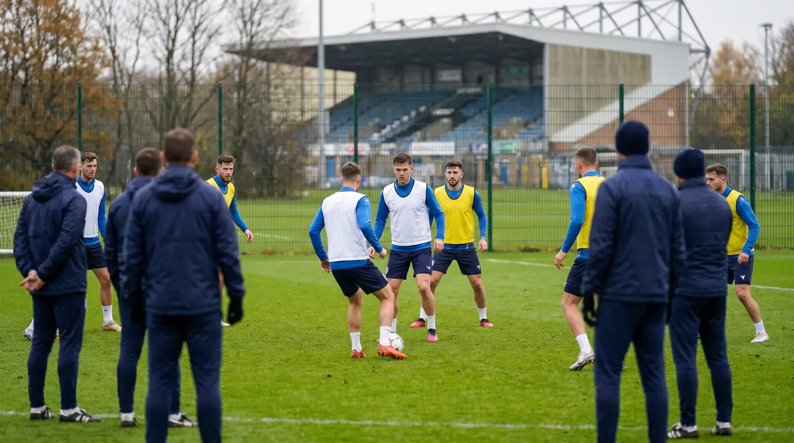 Recently relegated club training session in League One colours after parachute payment season